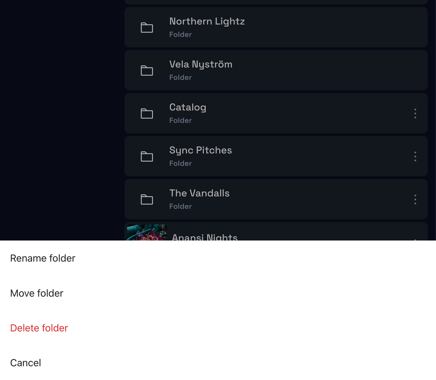A folder’s options sheet, Rename folder, Move folder, Delete folder and Cancel, open over the workspace’s folders and tracks