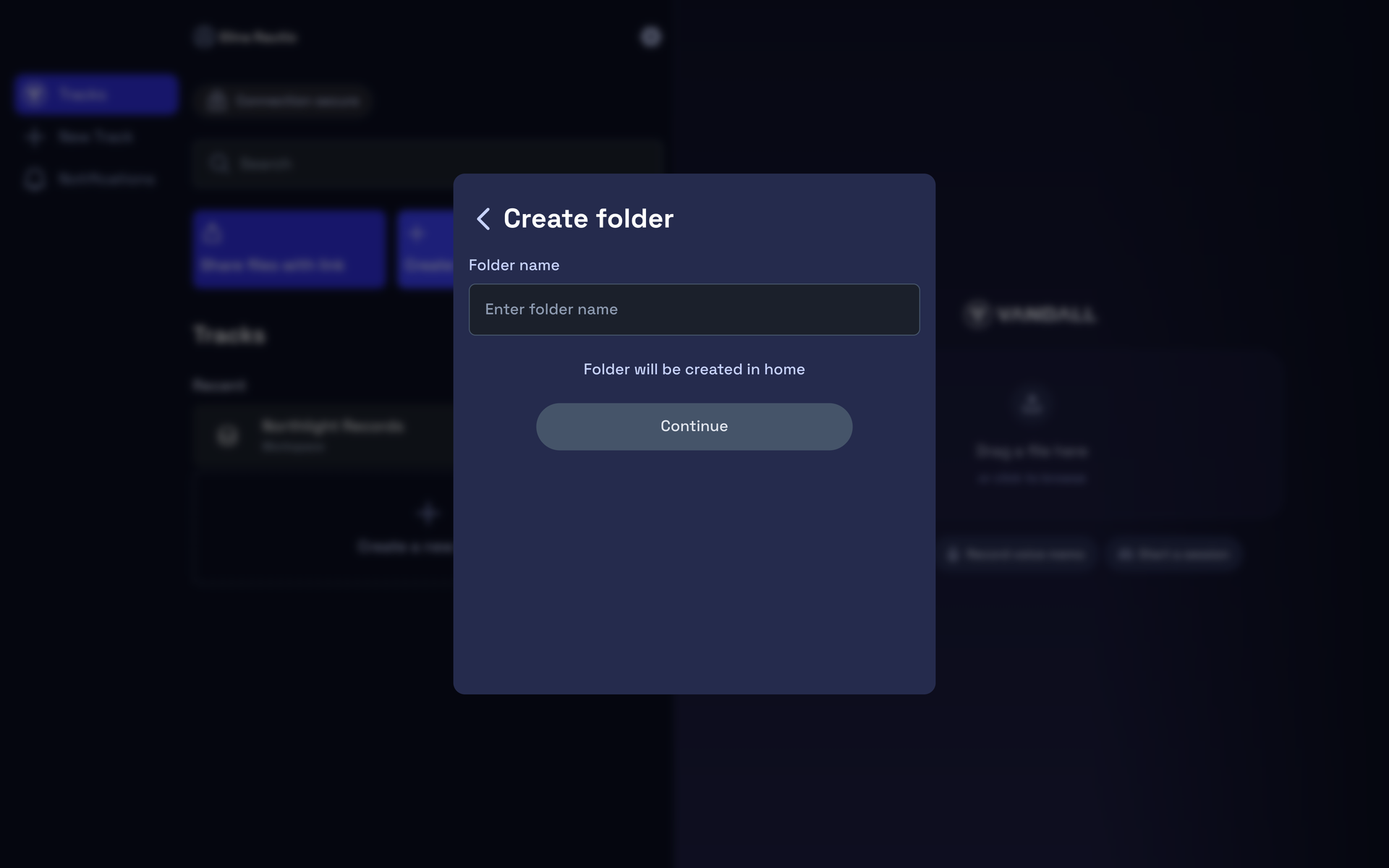 The new folder dialog with its name field over the track list