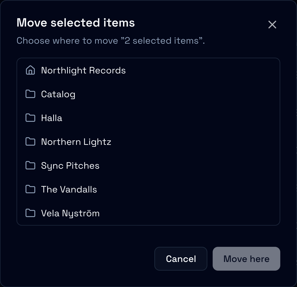 The Move selected items dialog with the workspace’s folders listed and the Move here button